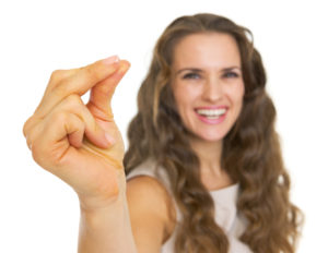 Smiling woman snapping fingers